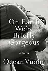 "On Earth We're Briefly Gorgeous" book cover with a zoomed in black and white photo of two people with their arms wrapped around each other.